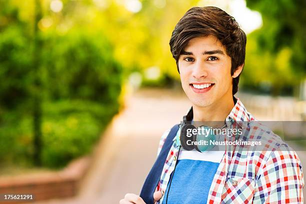 student with headphones around neck on campus - 18 stock pictures, royalty-free photos & images