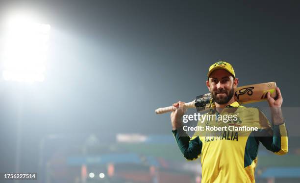 Glenn Maxwell of Australia poses for a photo following their 106, the fastest hundred in World Cup history following the ICC Men's Cricket World Cup...