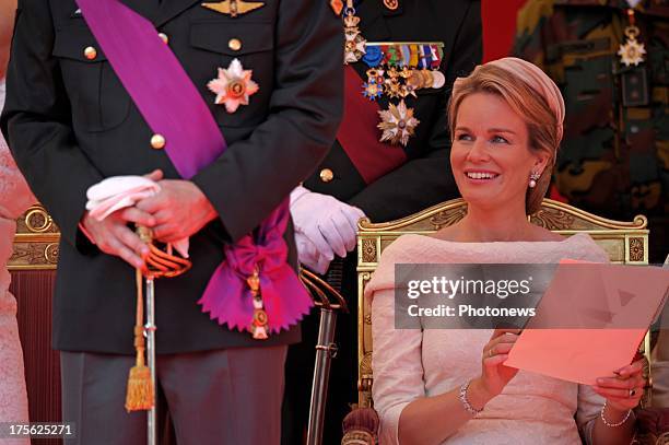 Queen Mathilde of Belgium watches during the Military Parade on July 21, 2013 in Brussels, Belgium.