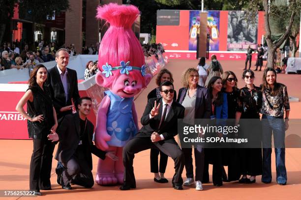 Antonio Stash Fiordispino, Lodovica Comello, guests, and Princess Poppy mascot attend the red carpet for "Trolls 3" during the 18th Rome Film...