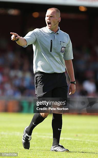 Referee Charles Breakspear in action during the Sky Bet League Two match between York City and Northampton Town at Bootham Crescent on August 3, 2013...