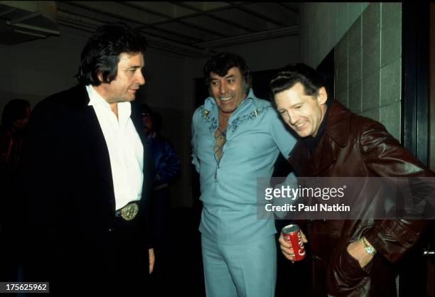 Singers Johnny Cash, Carl Perkins, and Jerry Lee Lewis at the Dane County Coliseum, Madison, Wisconsin, February 18, 1982.