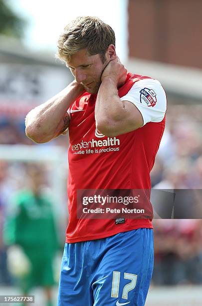 Richard Cresswell of York City leaves the pitch after a clash of heads during the Sky Bet League Two match between York City and Northampton Town at...