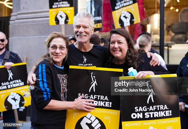 Edie Falco, Stephen Lang and Rebecca Damon join SAG-AFTRA members on strike on October 25, 2023 in New York City. The strike, which began on July...