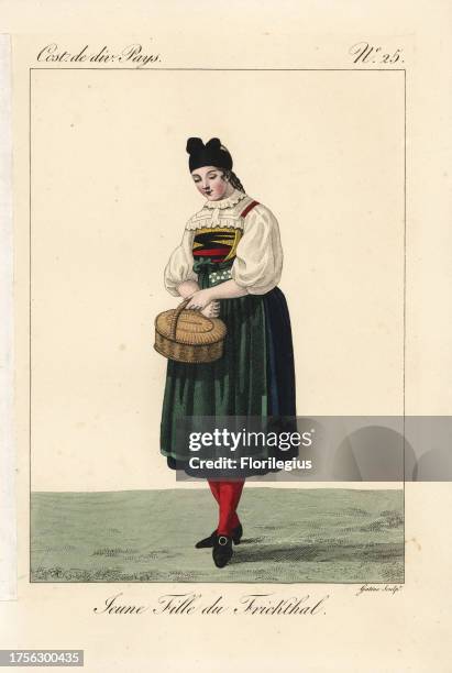 Young woman of Frick, Switzerland, 19th century. Her costume features deep green, blue, daffodil and black. Handcoloured copperplate engraving by...