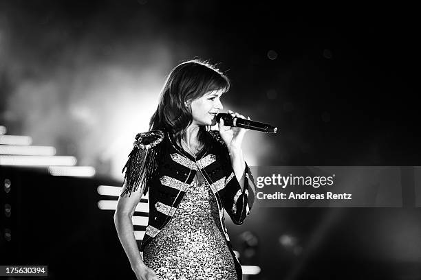 Andrea Berg performs on stage during the Andrea Berg Open Air festival 'Heimspiel' at comtech Arena on July 20, 2013 in Aspach near Stuttagrt,...