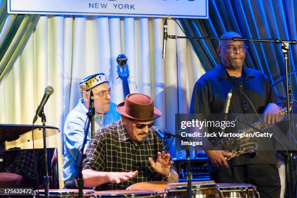 American Jazz musician Jerry Gonzalez plays congas as he leads the Ft. Apache Band with his brother Andy Gonzalez , on upright electric bass, and Joe...