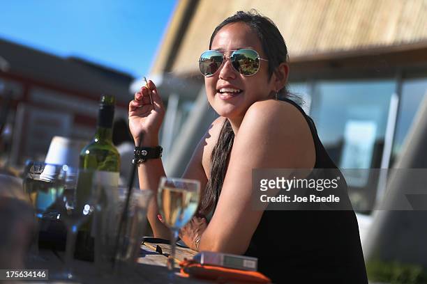 Beth Karline Poulenc enjoys the outdoors with friends on a warm afternoon on July 29, 2013 in Nuuk, Greenland. Nuuk, the capital of the country of...