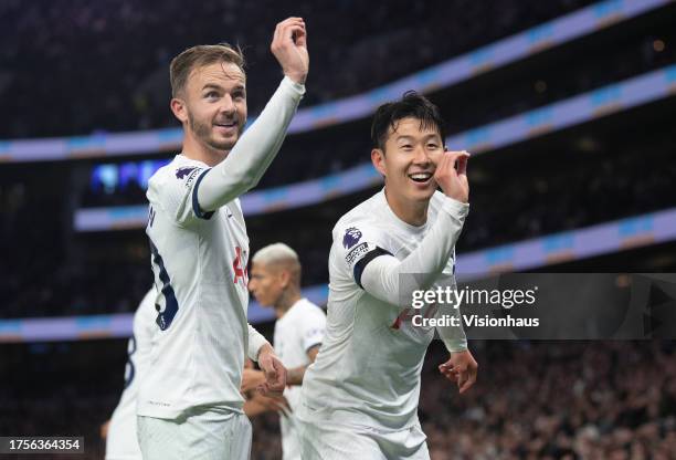 James Maddison of Tottenham Hotspur celebrates his goal with Son Heung-min during the Premier League match between Tottenham Hotspur and Fulham FC at...