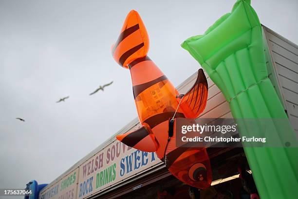 Booth on Rhyl Promenade sells inflatable toys on August 5, 2013 in Rhyl, Wales. The think tank The Centre for Social Justice has today said that some...