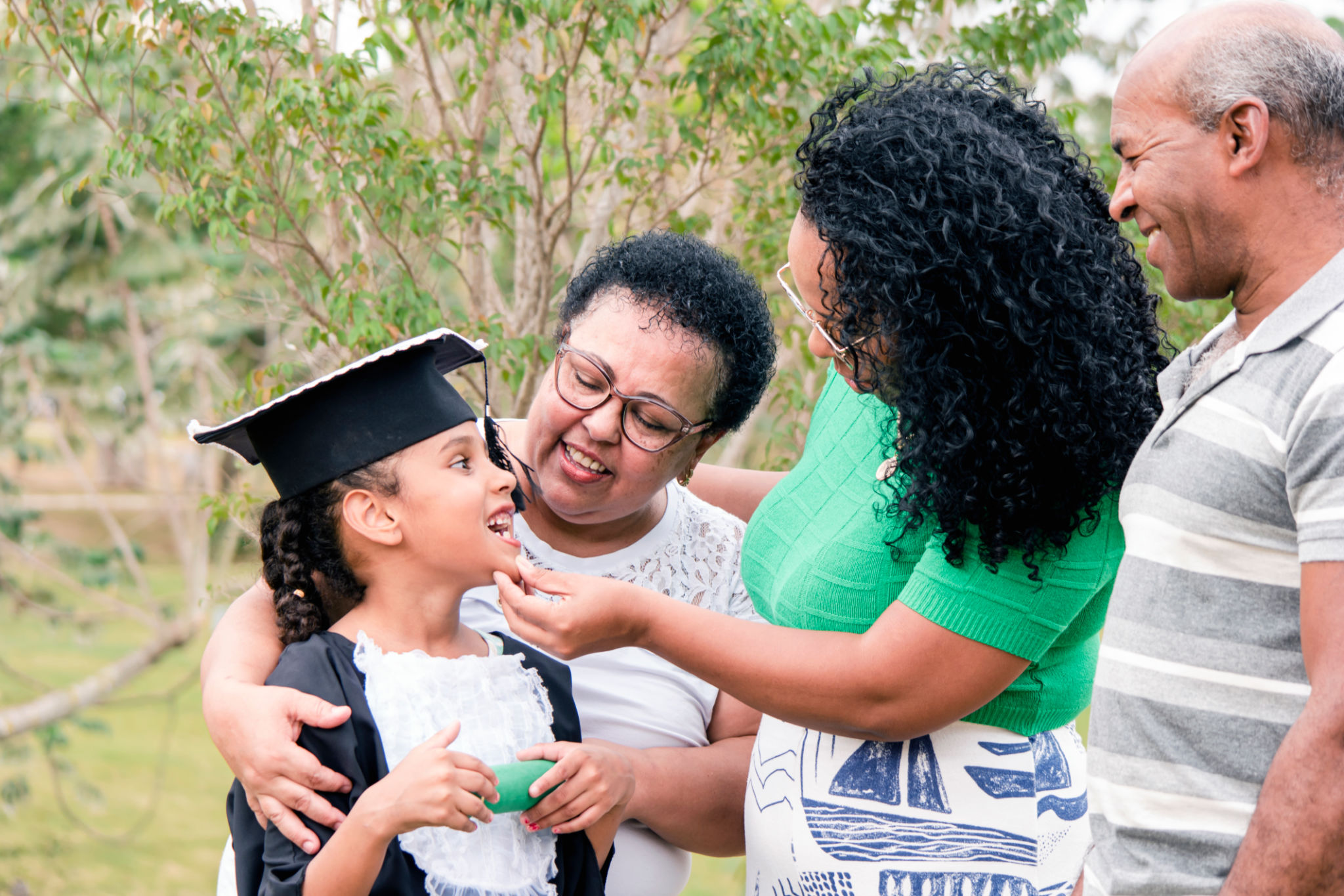 Family in the preschool graduation cerimony Family in the preschool graduation cerimony