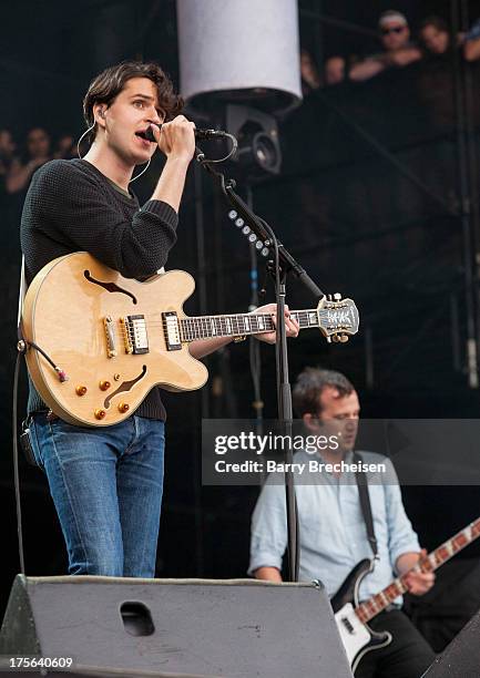 Ezra Koenig and Chris Baio of Vampire Weekend perform during Lollapalooza 2013 at Grant Park on August 4, 2013 in Chicago, Illinois.