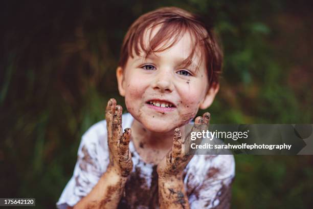 covered in mud! - people covered in mud stock pictures, royalty-free photos & images