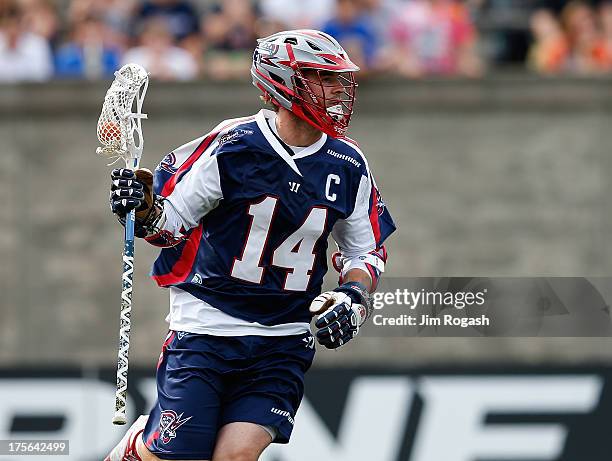 Ryan Boyle of the Boston Cannons runs the ball against the Ohio Machine at Harvard Stadium on August 3, 2013 in Boston, Massachusetts.