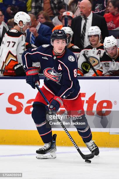 Zach Werenski of the Columbus Blue Jackets skates with the puck during the third period of a game against the Anaheim Ducks at Nationwide Arena on...
