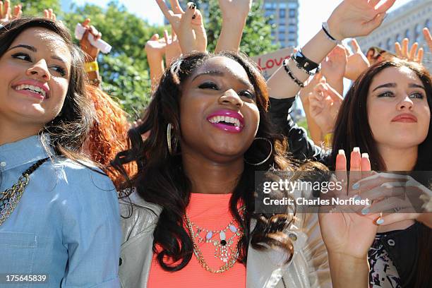 Camila Cabello, Normani Hamilton and Lauren Jauregui of Fifth Harmony visit Madison Square Park on August 5, 2013 in New York City.