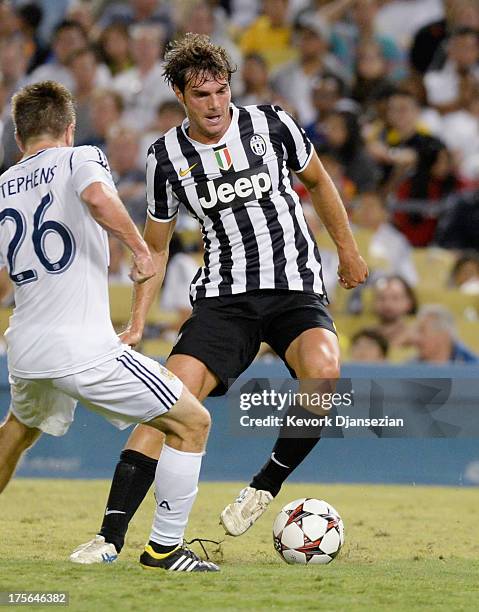 Paolo De Cegile of Juventus in action against Michael Stephens of Los Angeles Galaxy during 2013 Guinness International Champions Cup at Dodger...