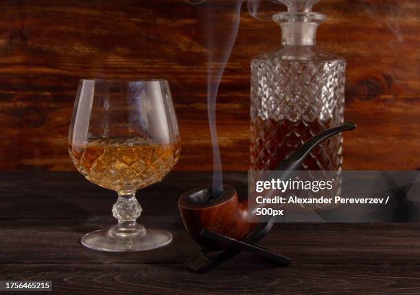 close-up of wine glass on table - brandy alexander stock pictures, royalty-free photos & images