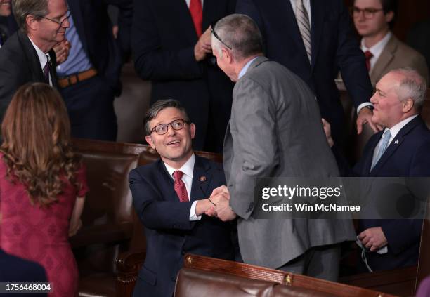 House Republicans shake hands with newly elected Speaker of the House Mike Johnson after the House of Representatives held an election in the U.S....