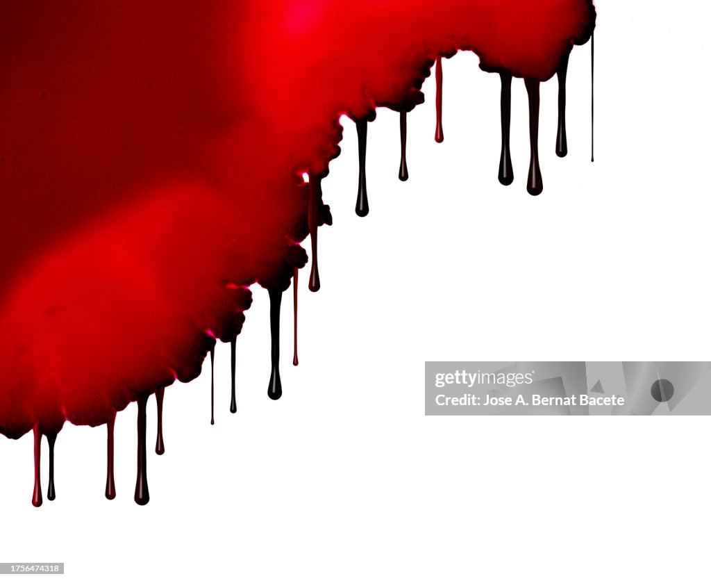 Drop of blood on a wall slides and drips.