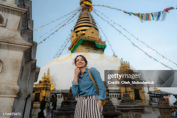 woman exploring  monkey temple  in kathmandu - diamond plate stock pictures, royalty-free photos & images