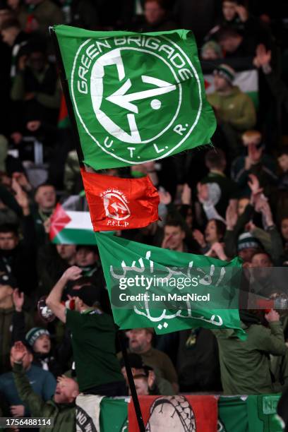 Supporters display flags prior to the UEFA Champions League match between Celtic FC and Atletico Madrid at Celtic Park Stadium on October 25, 2023 in...