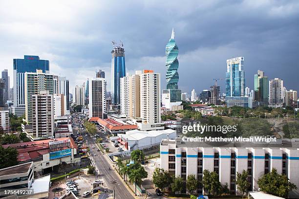 a view overlooking the city skyline - panama stock-fotos und bilder