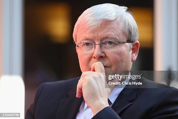 Australian Prime Minister Kevin Rudd looks on during a debate at the Colmslie Hotel on August 6, 2013 in Brisbane, Australia. On the second day of...