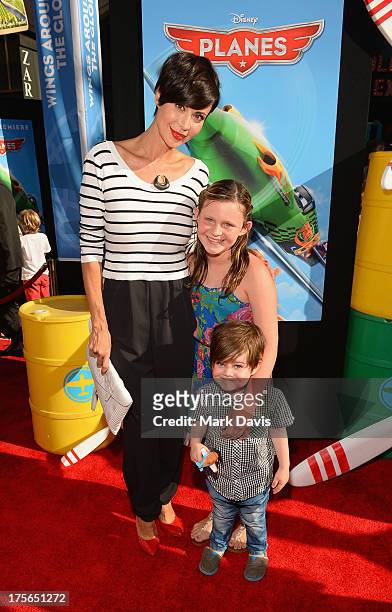 Actress Catherine Bell and daughter, Gemma Beason and son, Ronan Beason attend the premiere of Disney's "Planes" at the El Capitan Theatre on August...