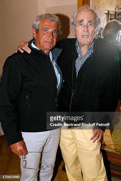 Artistic Director of the Festival Michel Boujenah and ccomposer Michel Legrand after "Un drole de pere" play at 29th Ramatuelle Festival day 6 on...
