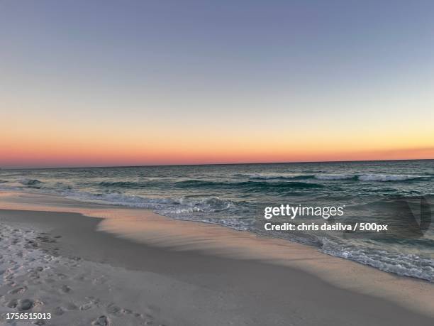 scenic view of sea against clear sky during sunset,okaloosa island,florida,united states,usa - okaloosa island stock pictures, royalty-free photos & images