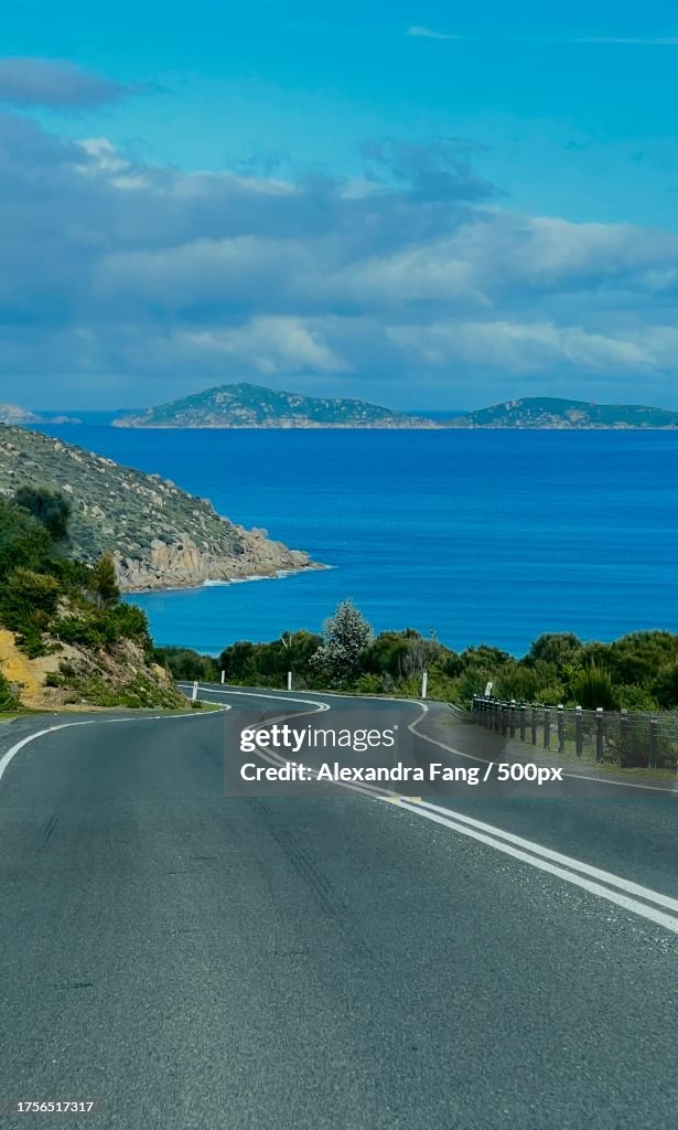 Empty road by sea against sky,Wilsons Promontory,Victoria,Australia