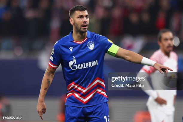 Aleksandar Dragovic of FK Crvena zvezda gestures during the UEFA Champions League match between RB Leipzig and FK Crvena zvezda at Red Bull Arena on...