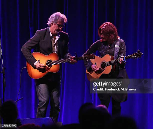 Recording artists John Leventhal and Rosanne Cash perform onstage during the "Nashville 2.0" presentation at the PBS portion of the 2013 Summer...