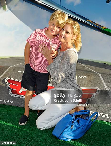 Actress Julie Bowen and Oliver McLanahan Phillips at the world-premiere of "Disney's Planes" presented by Target at the El Capitan Theatre on August...