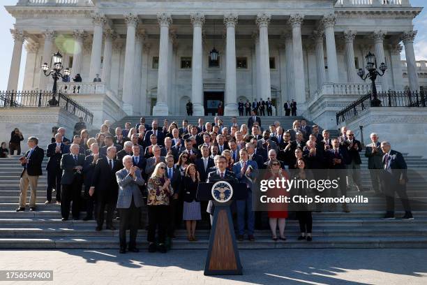 Newly elected U.S. Speaker of the House Mike Johnson delivers remarks with fellow Republicans on the East Front steps of the House of Representatives...