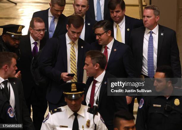Newly elected Speaker of the House Mike Johnson walks through statuary hall after being elected by fellow lawmakers the House of Representatives in...