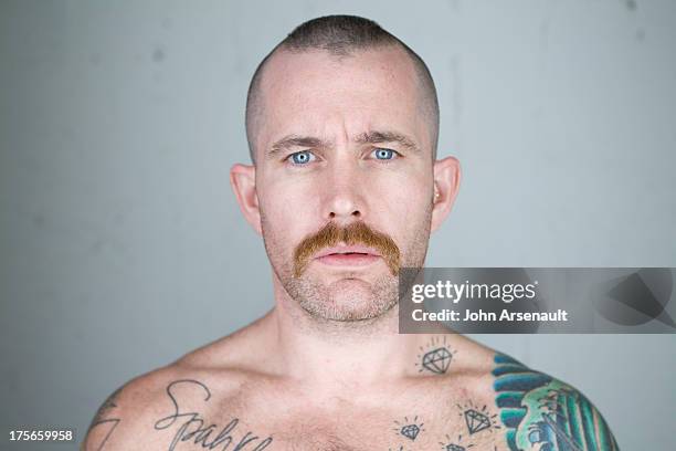 male, tattoos, portriat, gay, studio - handlebar moustache stock pictures, royalty-free photos & images