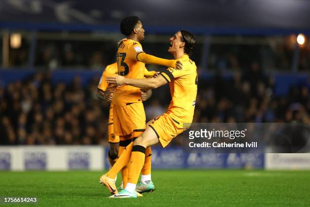 Jaden Philogene of Hull City celebrates with teammate Jacob Greaves after scoring the team's second goal during the Sky Bet Championship match...