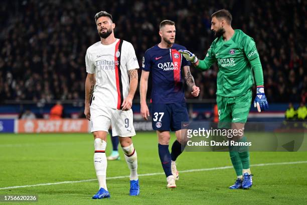 Olivier Giroud of AC Milan reacts after a missed chance during the UEFA Champions League match between Paris Saint-Germain and AC Milan at Parc des...