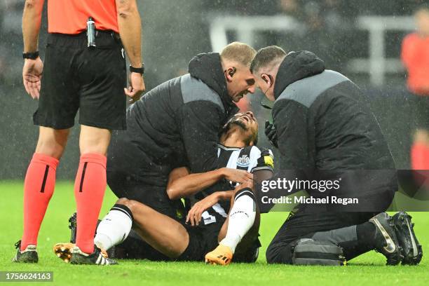 Jacob Murphy of Newcastle United receives medical treatment during the UEFA Champions League match between Newcastle United FC and Borussia Dortmund...