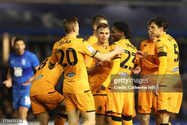 Jaden Philogene of Hull City celebrates with teammates after scoring the team's second goal during the Sky Bet Championship match between Birmingham...
