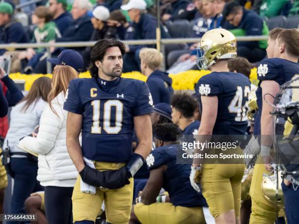Notre Dame Fighting Irish quarterback Sam Hartman looks on at his teammates during the college football game between the Pittsburgh Panthers and the...
