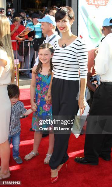 Catherine Bell, Gemma Beason and Ronan Beason attend the Disney's "Planes" Los Angeles premiere held at the El Capitan Theatre on August 5, 2013 in...