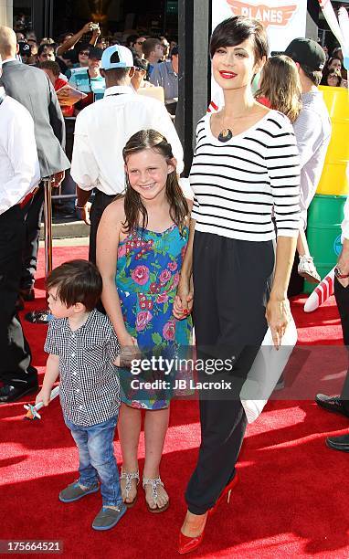 Catherine Bell, Gemma Beason and Ronan Beason attend the Disney's "Planes" Los Angeles premiere held at the El Capitan Theatre on August 5, 2013 in...