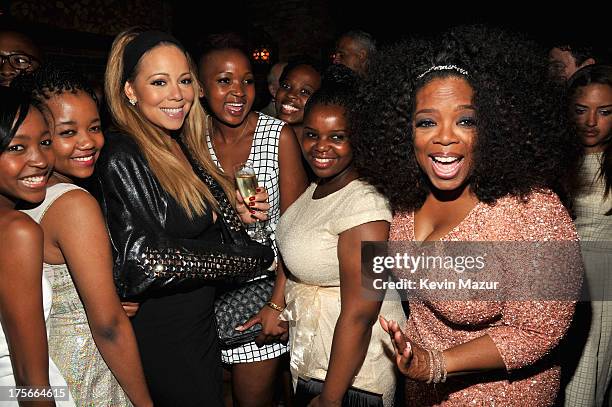 Mariah Carey and Oprah Winfrey pose with guests at Lee Daniels' "The Butler" New York premiere, hosted by TWC, DeLeon Tequila and Samsung Galaxy on...