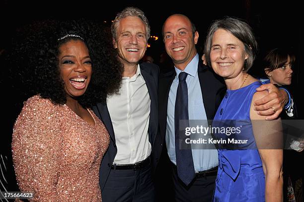 Oprah Winfrey poses with guests at Lee Daniels' "The Butler" New York premiere, hosted by TWC, DeLeon Tequila and Samsung Galaxy on August 5, 2013 in...