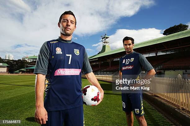 John Hutchinson and Marcos Flores pose during a Central Coast Mariners A-League media announcement at North Sydney Oval on August 6, 2013 in Sydney,...