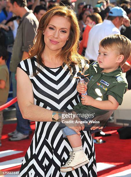 Actress Alyssa Milano and son Milo Thomas Bugliari arrive at the premiere of Disney's 'Planes' presented by Target at the El Capitan Theatre on...