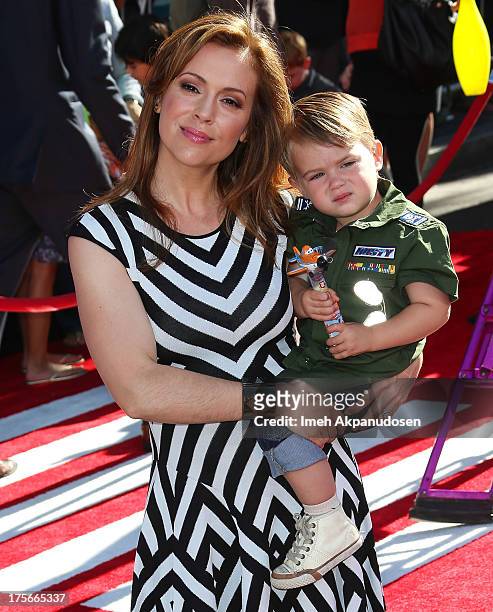 Actress Alyssa MIlano and her son, Milo Thomas Bugliari, attend the premiere of Disney's 'Planes' at the El Capitan Theatre on August 5, 2013 in...